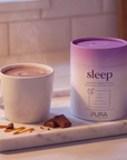 Pura Collagen Sleep supplement bottle with label, featuring capsules and sleep-related branding on a white background.